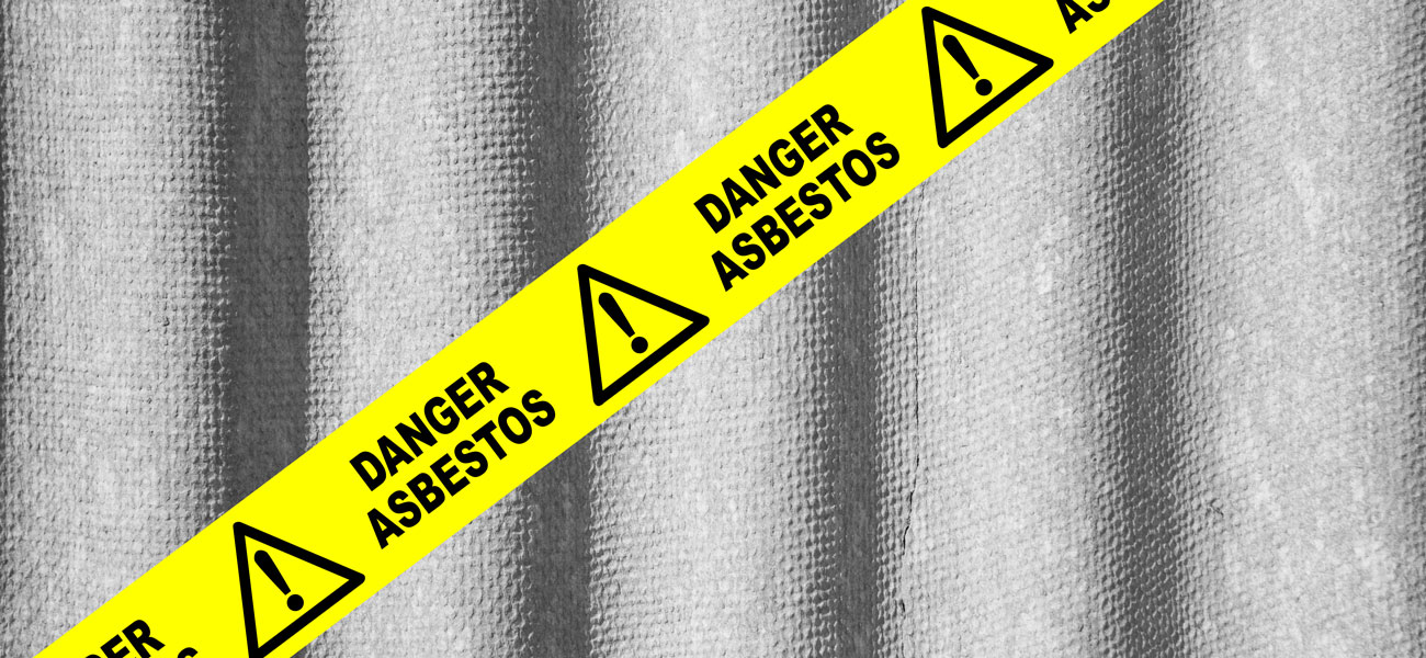 Asbestos, with hazard tape.