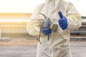 man wearing PPE RPE safety equipment