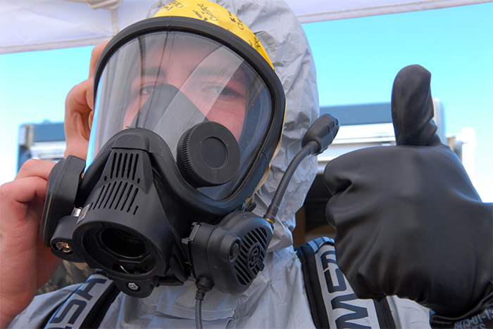 man in PPE giving thumbs up